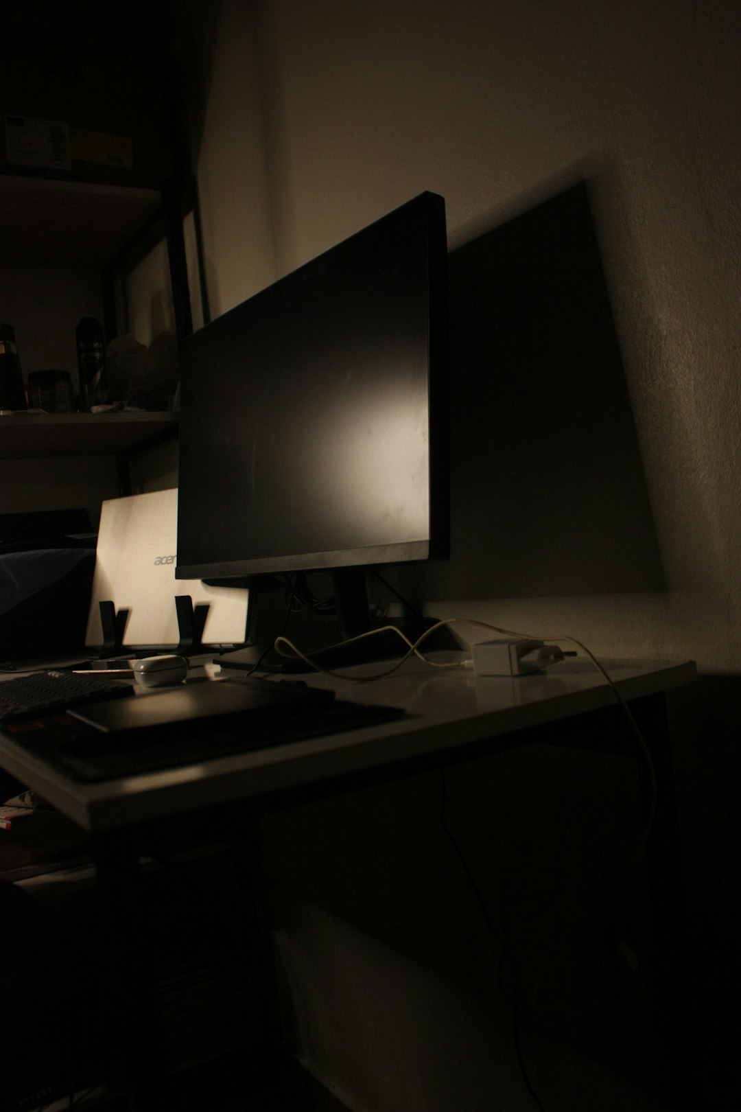 Linux desktop environment glowing on a monitor at night
