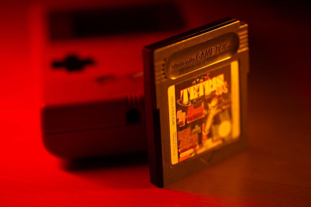 Vintage game cartridge standing upright with dramatic lighting