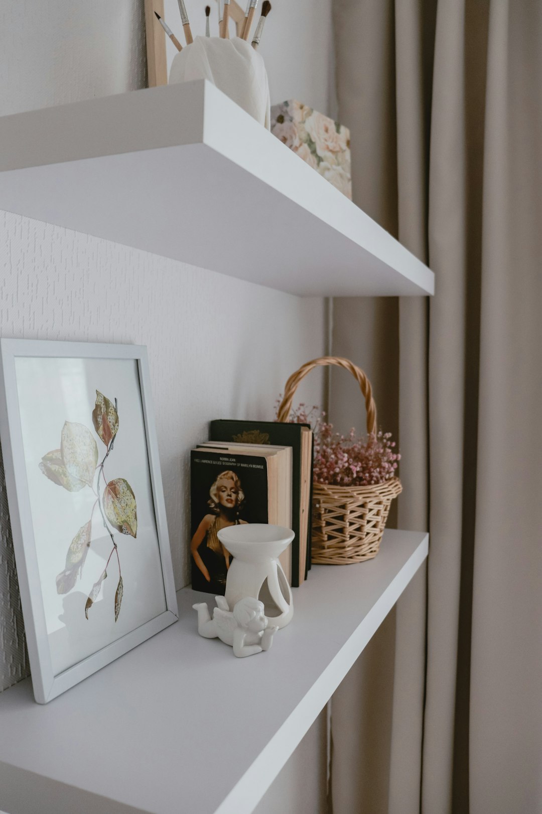 Pinterest-style vertical home office nook with rattan pendant and golden hour light
