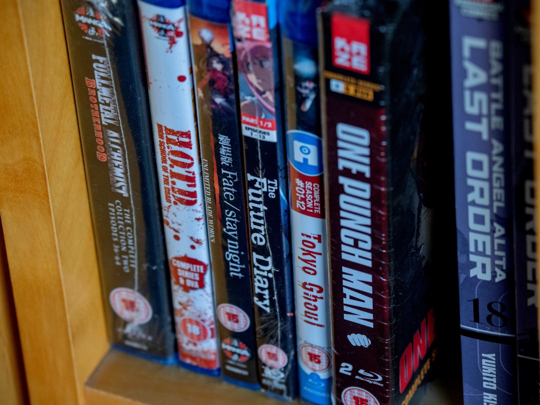 Game shelf with physical cases and one open disc case