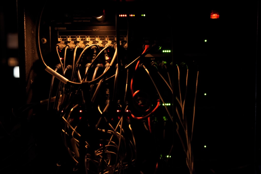 Glowing power cable in dark server room