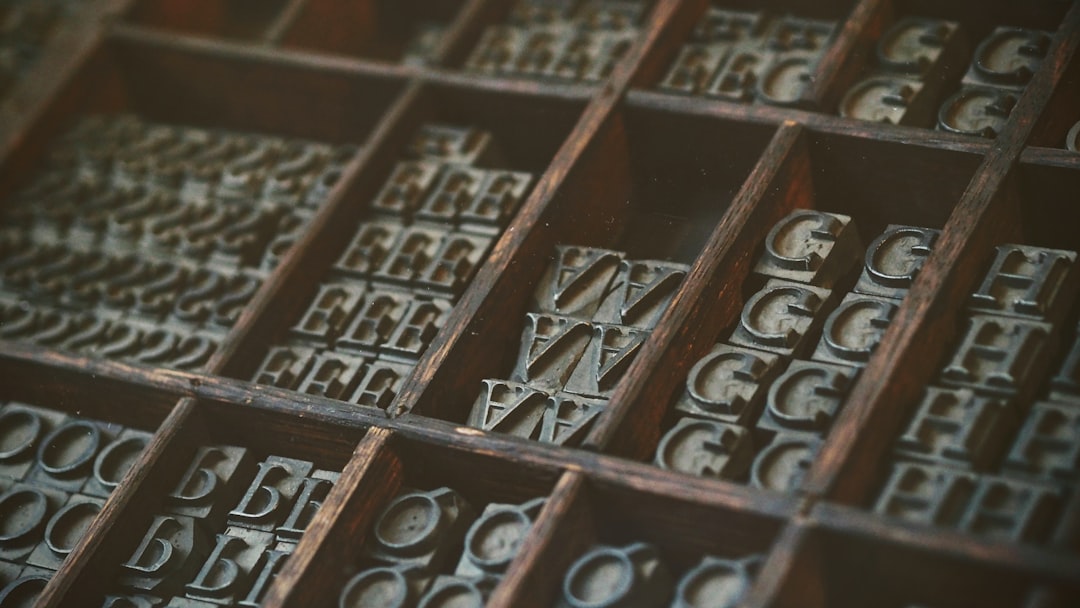 15th century printing press workshop with workers