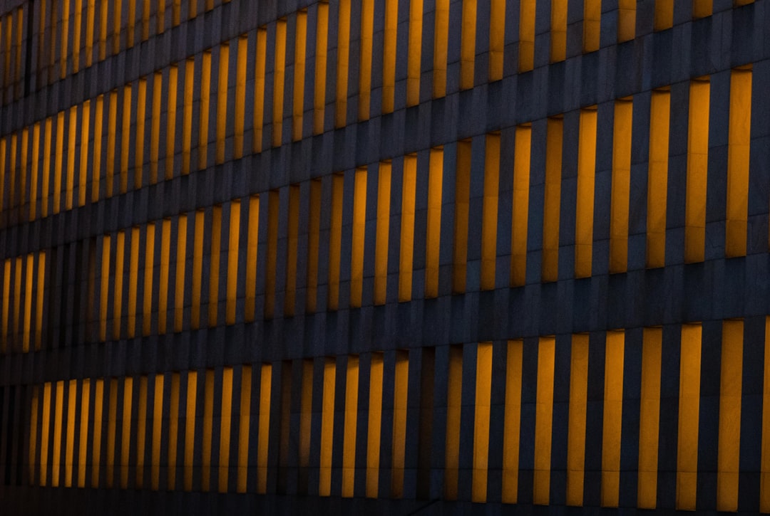 Corporate headquarters building at dusk suggesting decline