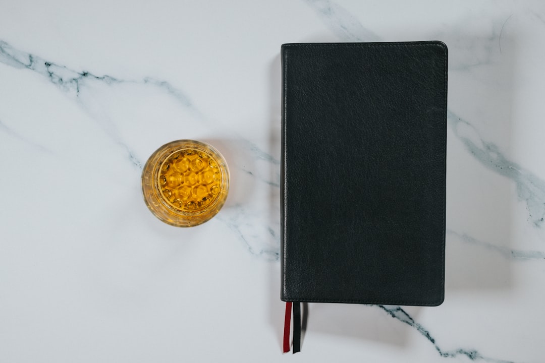 Coins in a glass jar on a minimalist desk