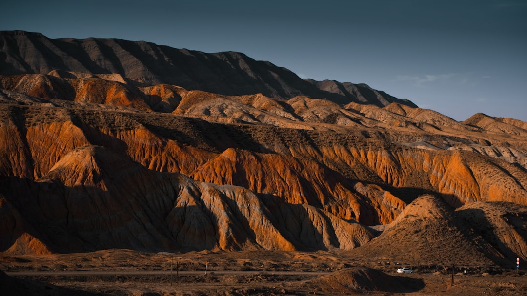 Wide aerial view of a large open-pit gold mine