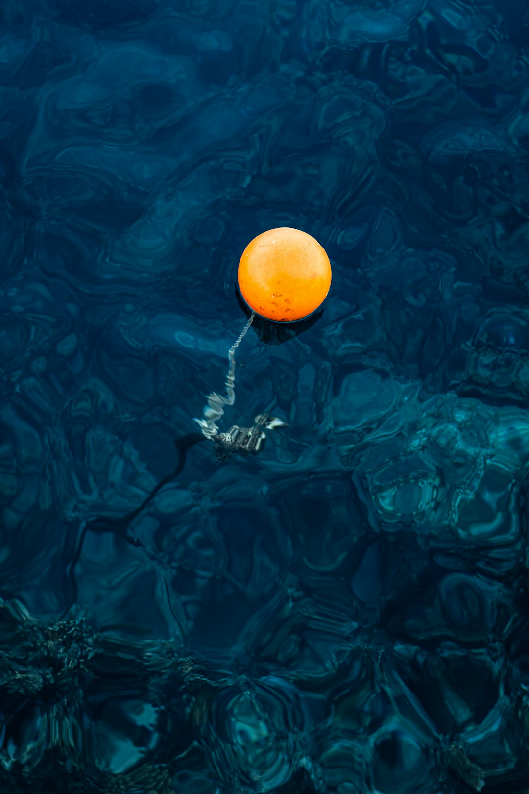 Underwater drone ascending toward ocean surface
