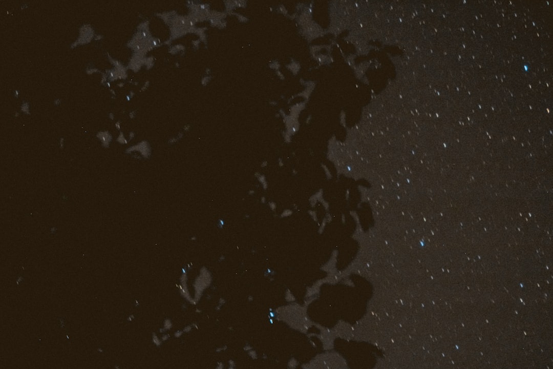 Starry universe with atomic structure overlay