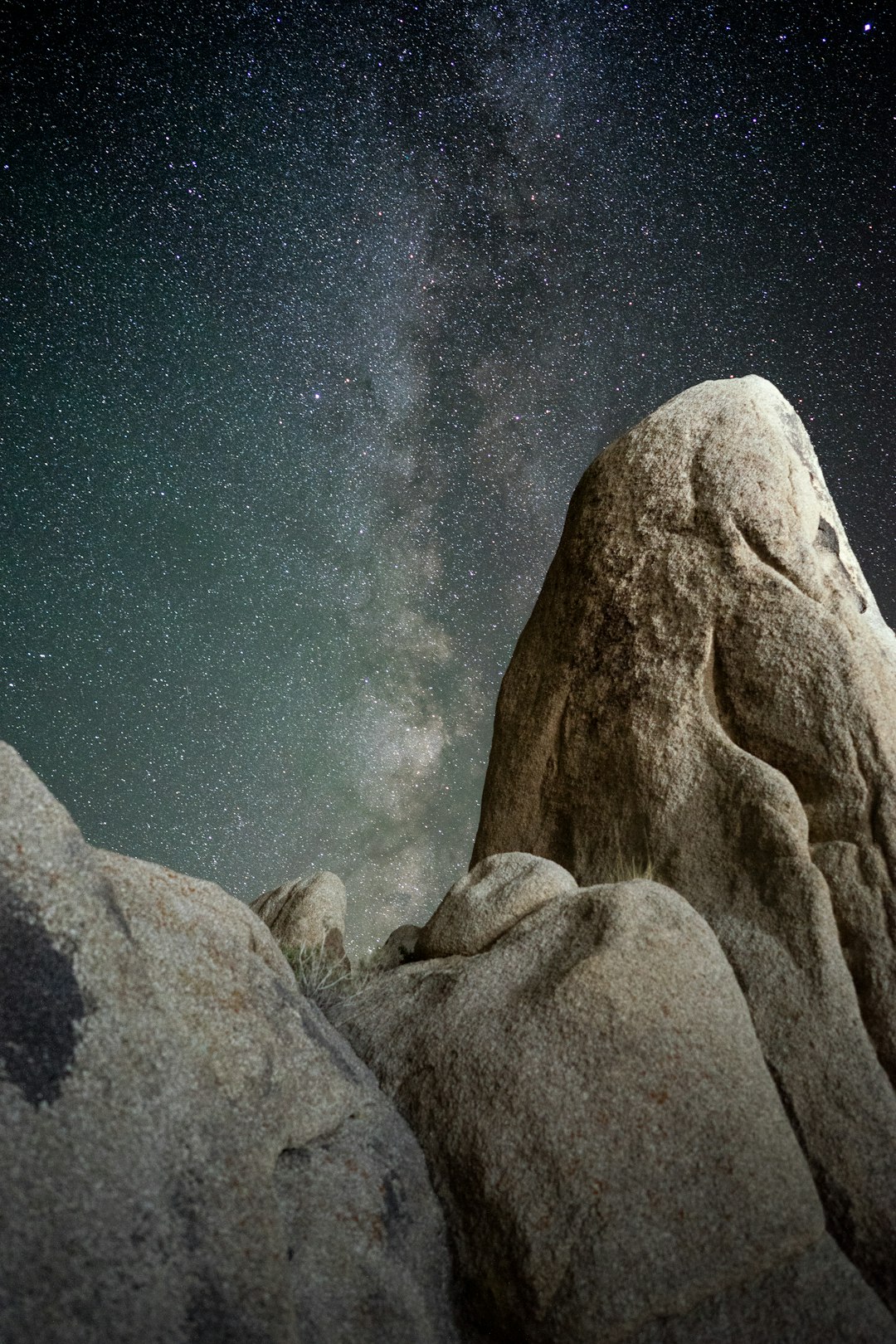 Silhouette of person gazing at starry night sky