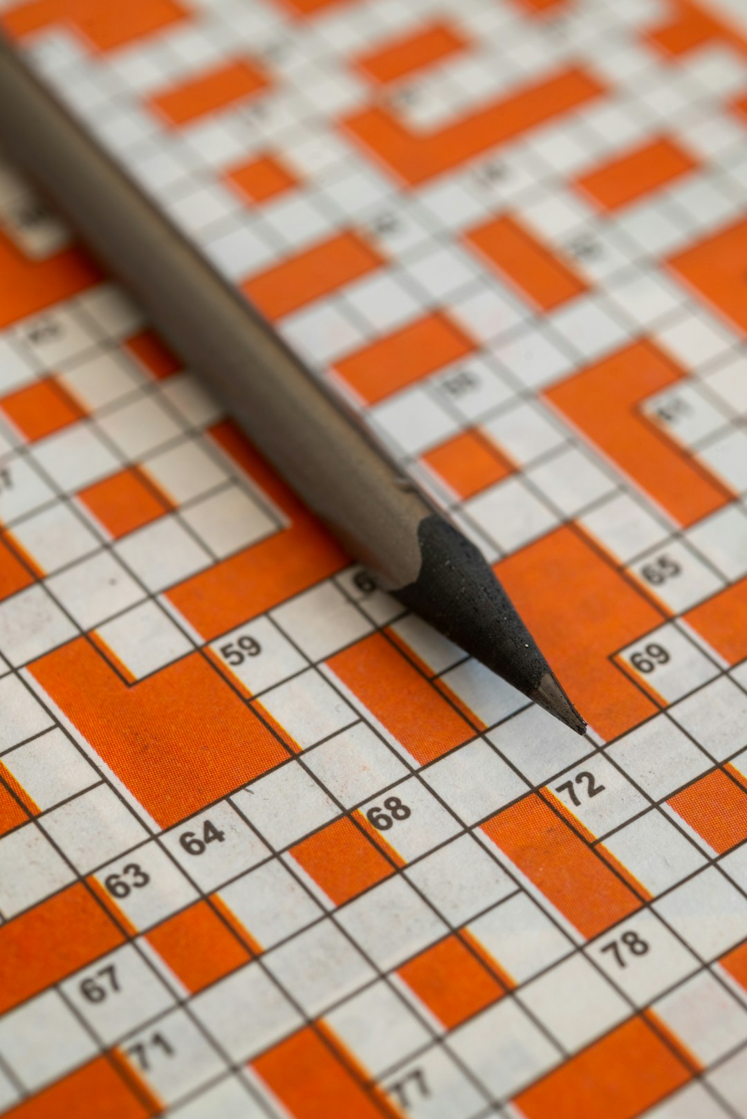 Completed crossword puzzle grid filled with ink