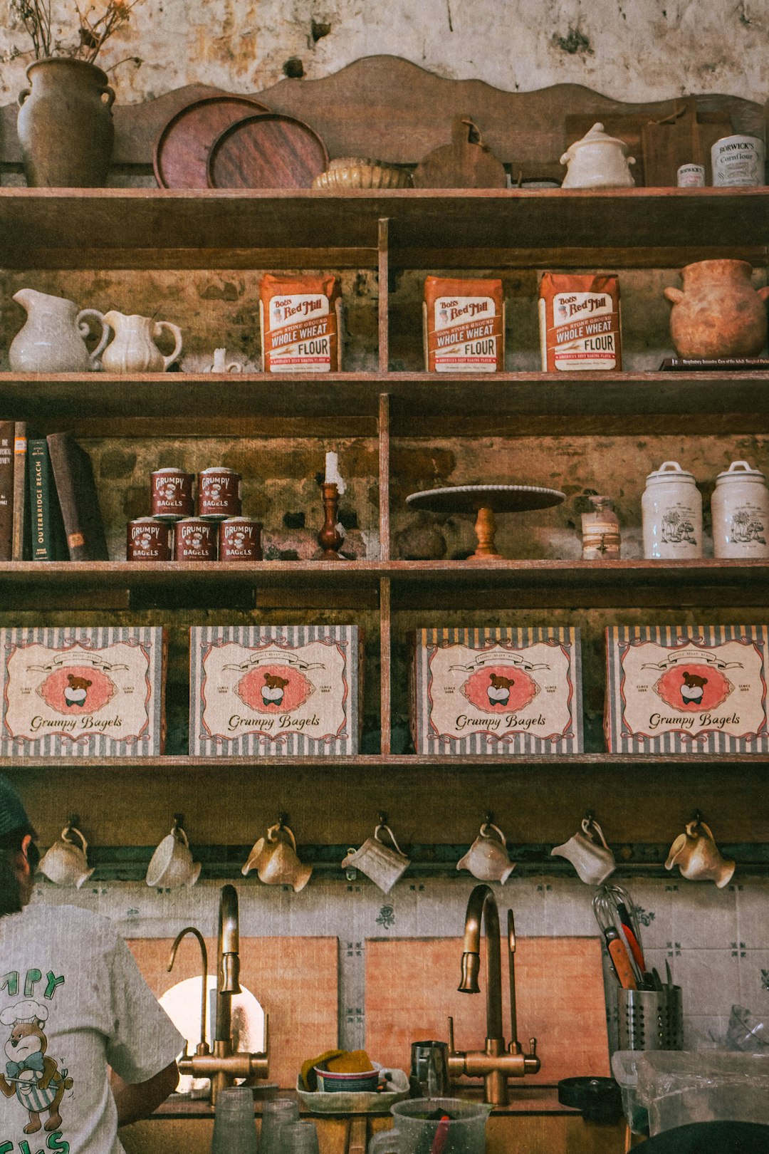 Vintage kitchen shelf with old recipe cards and nostalgic objects