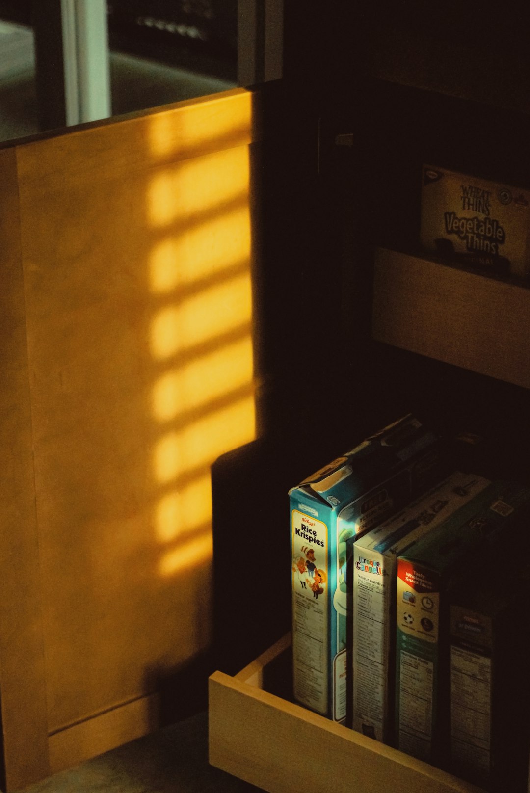 Physical game case shadow reaching toward digital storefront
