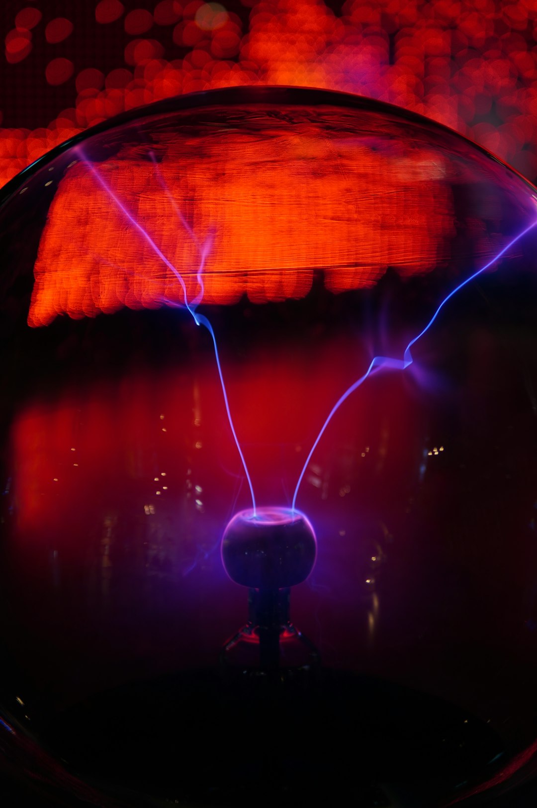 Dramatic close-up of static electricity spark between fingertips