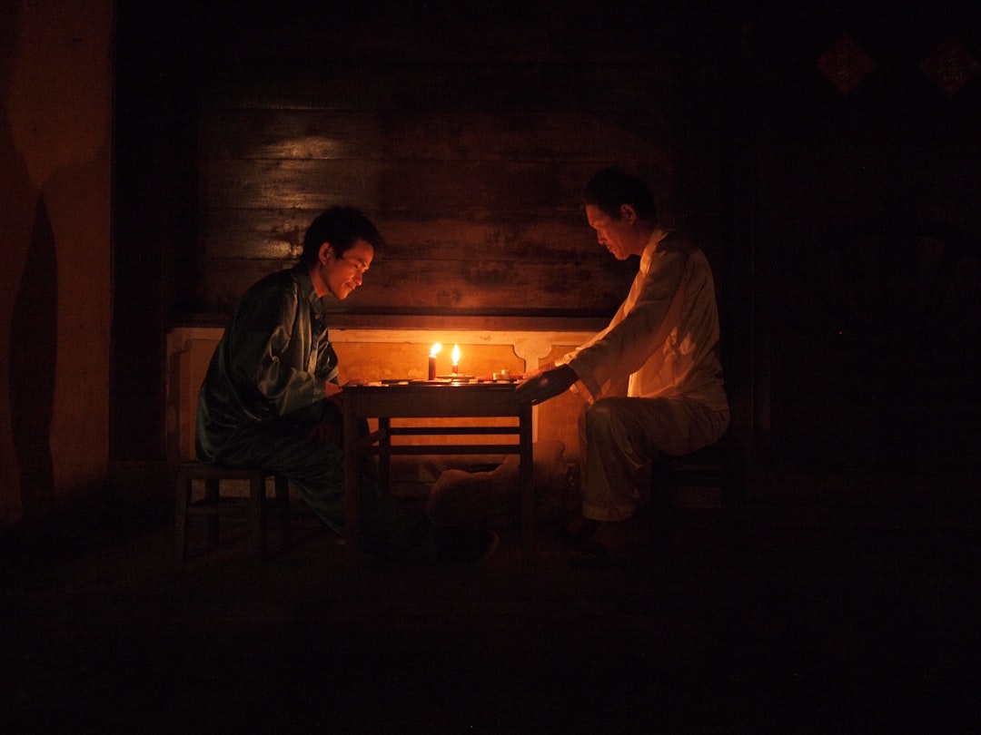 Two people having a sincere conversation at a table