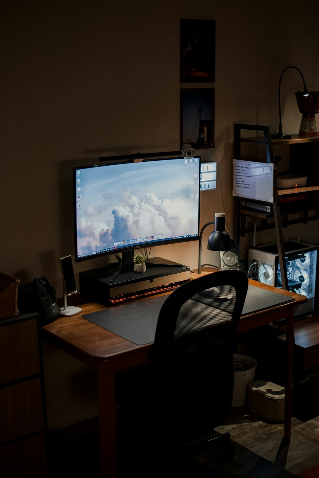 Researcher analyzing seismic data on multiple monitors