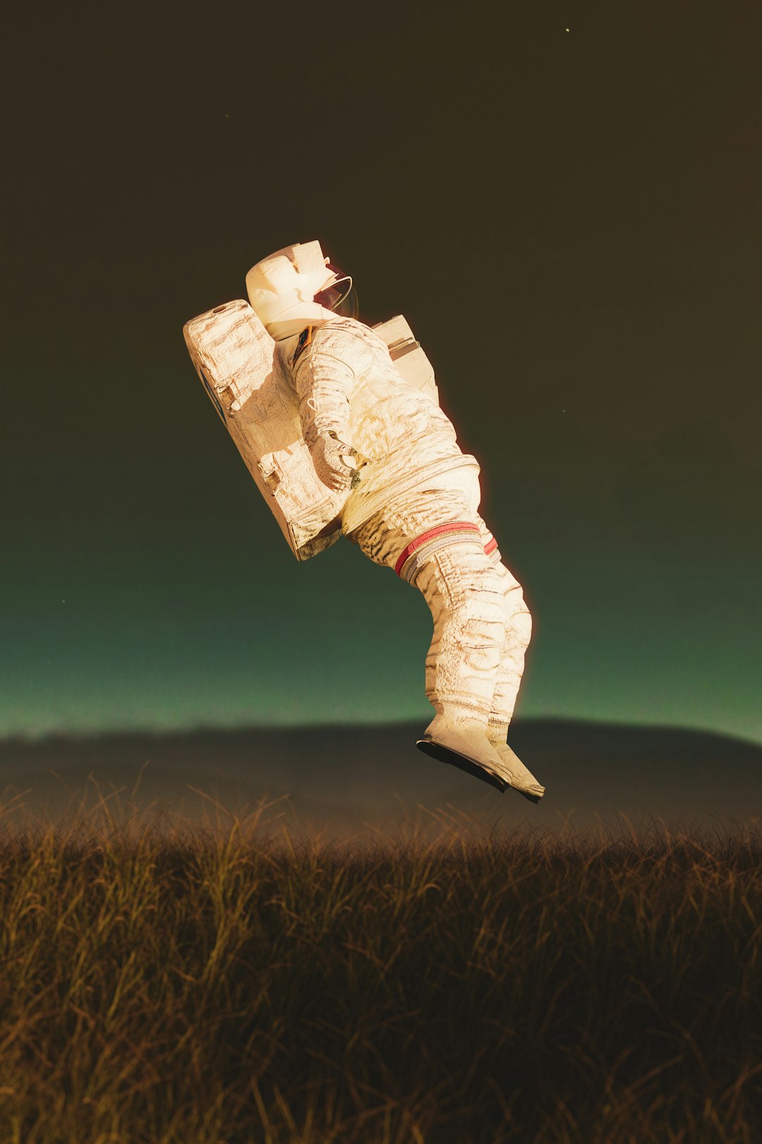Astronaut glove floating with Earth in background