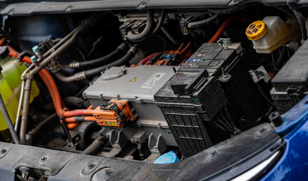 Electric vehicle component diagram showing battery and motor