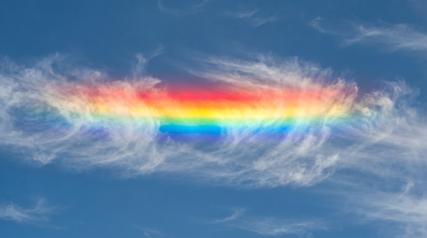 Close-up of fire rainbow color bands in cloud