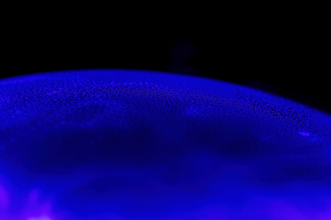 Planet silhouette transiting across a bright star surface
