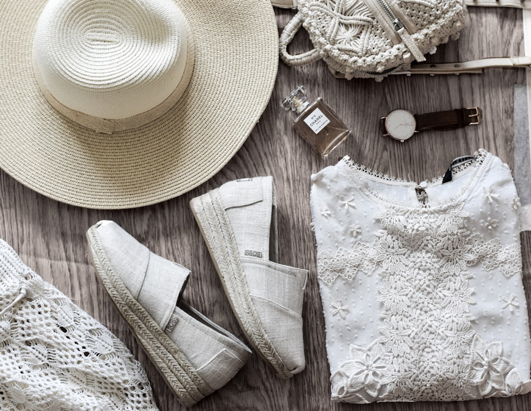 Overhead flat-lay of summer clothing and accessories